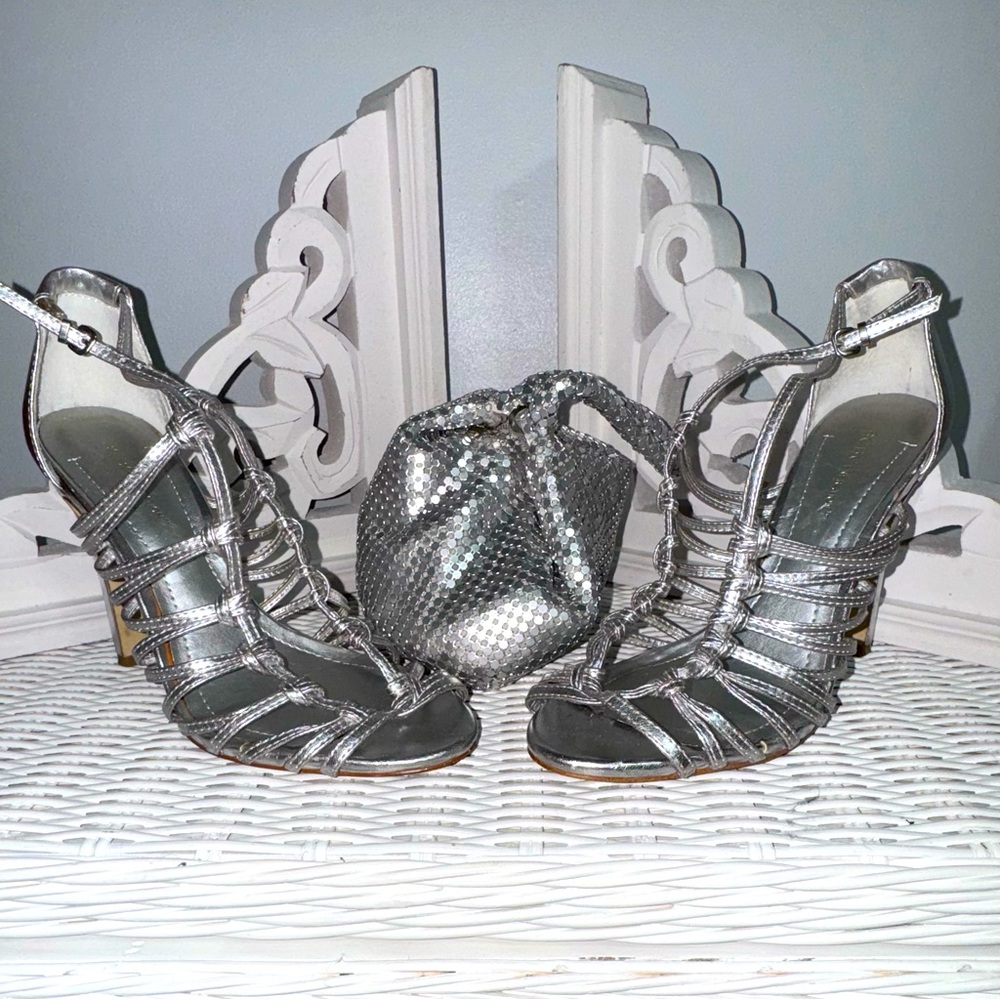 BCBG “Peetie” silver strappy 4 1/2 inch heels